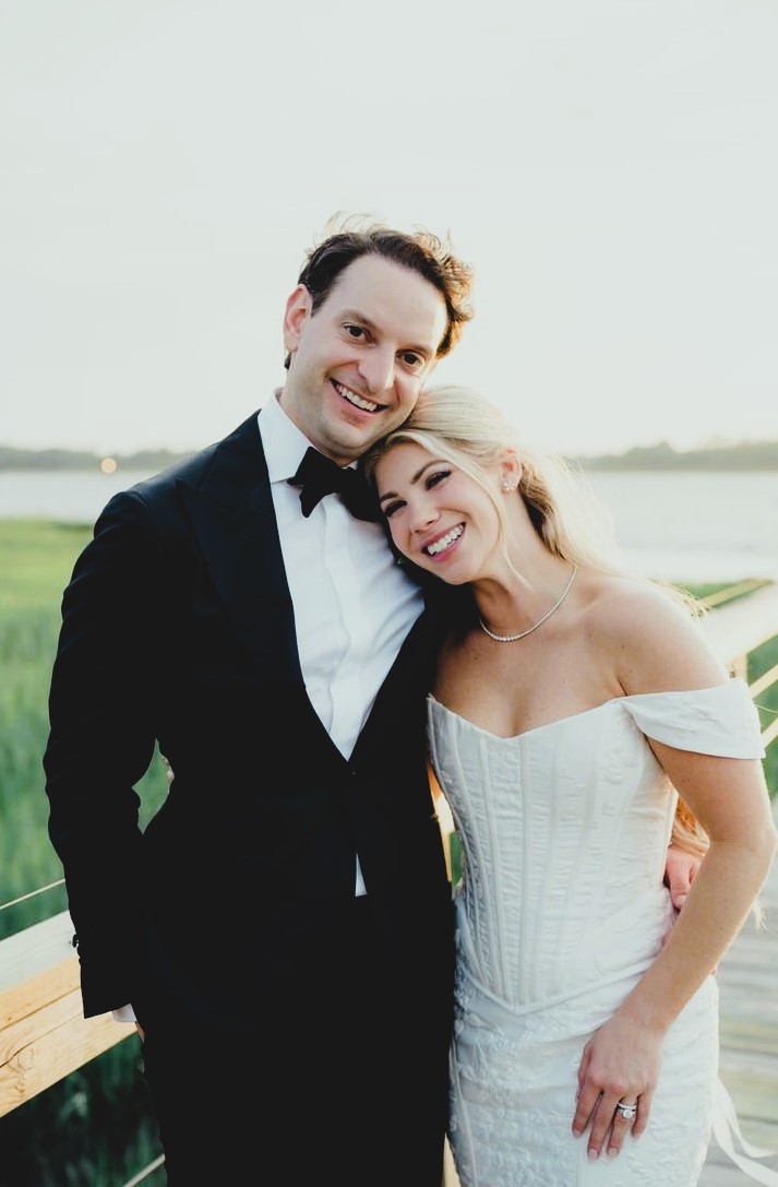Bride leaning on groom's shoulder