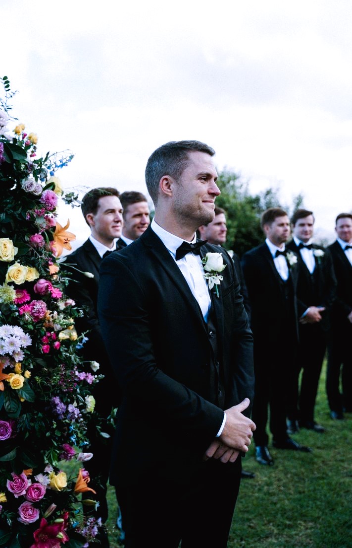 Groom waiting at altar