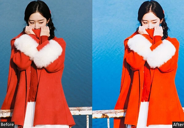Young woman in a red coat with white fur trim, covering her face with her hands, standing against a blue background, showcasing a before and after photo of photo editing.