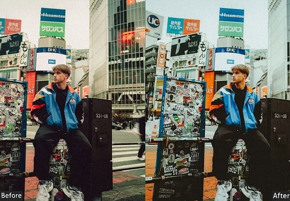 Young man in blue jacket sitting on city street corner with vibrant Tokyo billboards and advertisements in the background, showcasing urban lifestyle.